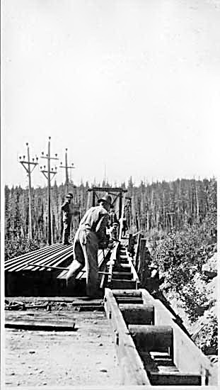 Men lifting abandoned C.P.R. rails at Phoenix VPL Accession Number: 1757 Date: 1917