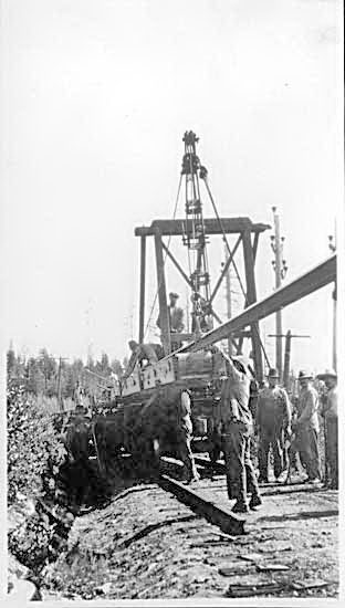 Men lifting abandoned C.P.R. rails at Phoenix VPL Accession Number: 1748 Date: 1917