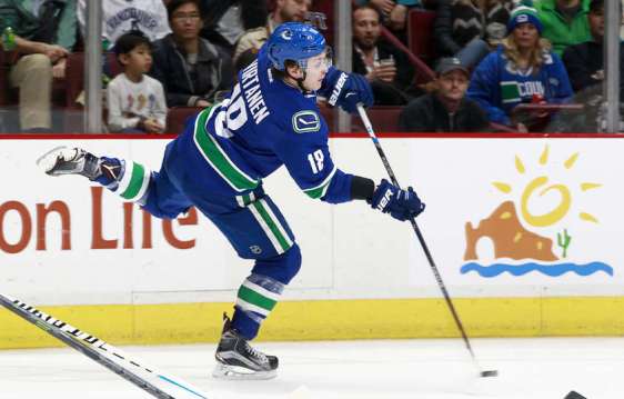 VANCOUVER, BC - MARCH 3: Jake Virtanen #18 of the Vancouver Canucks fires a shot at Martin Jones #31 of the San Jose Sharks during their NHL game at Rogers Arena March 3, 2016 in Vancouver, British Columbia, Canada. (Photo by Jeff Vinnick/NHLI via Getty Images)