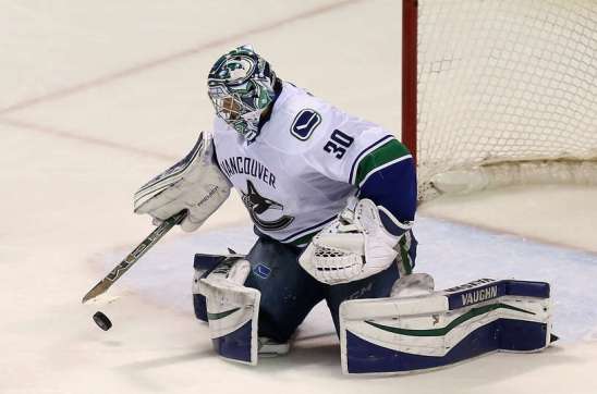 SAN JOSE, CA - MARCH 31: Ryan Miller #30 of the Vancouver Canucks makes a save during their game against the San Jose Sharks at SAP Center on March 31, 2016 in San Jose, California. (Photo by Ezra Shaw/Getty Images)