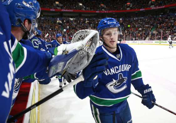 VANCOUVER, BC - APRIL 4: Jared McCann #91 of the Vancouver Canucks is congratulated at the bench after scoring against the Los Angeles Kings during their NHL game at Rogers Arena April 4, 2016 in Vancouver, British Columbia, Canada. Vancouver won 3-2. (Photo by Jeff Vinnick/NHLI via Getty Images)